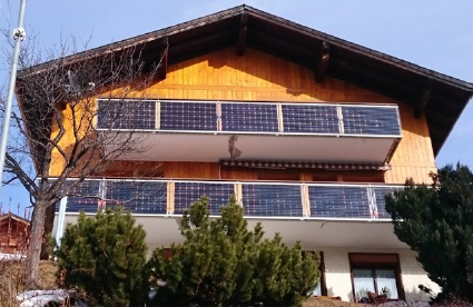 chalet with photovoltaics on the balcony